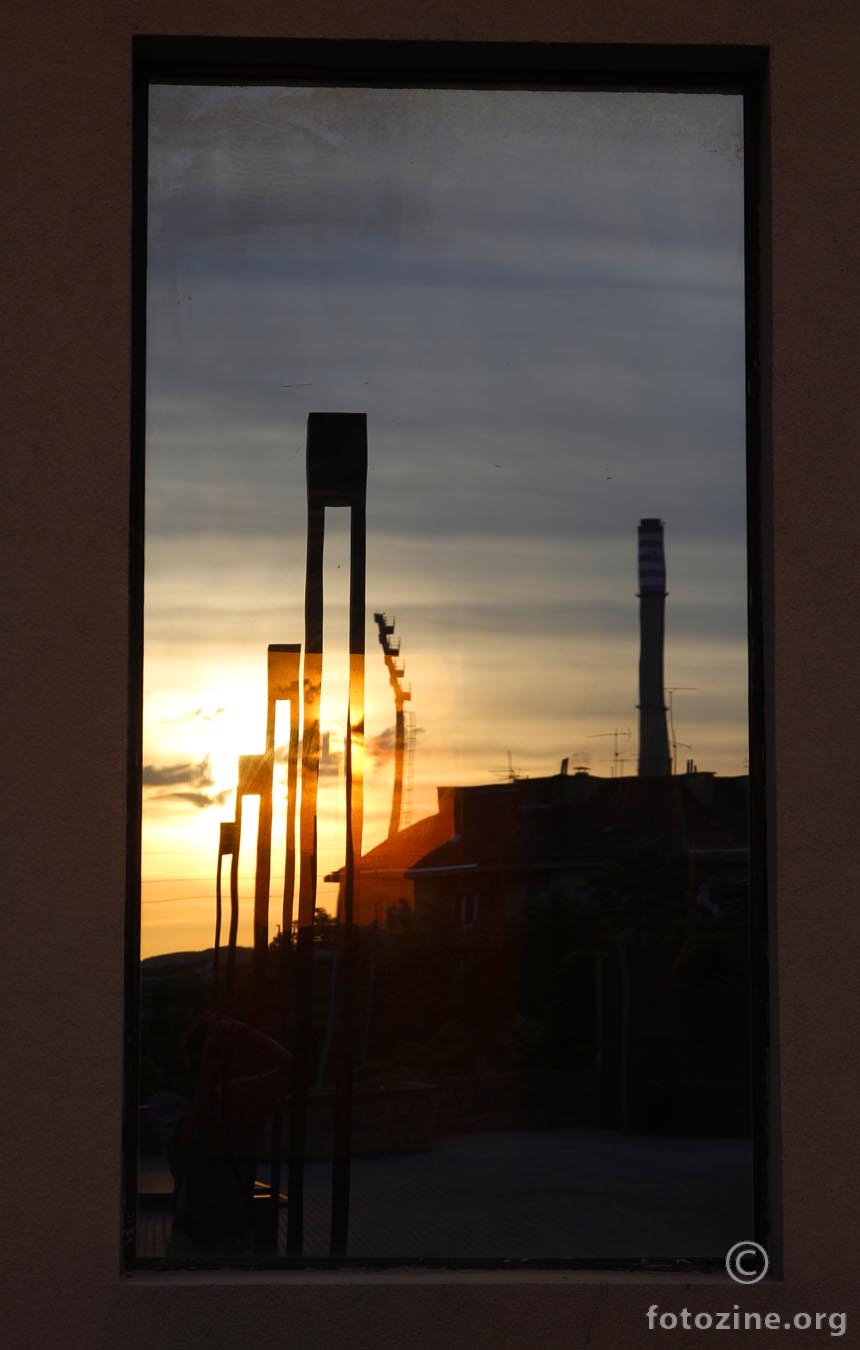 The window of the industrial setting sun